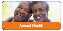Sexual Health: An African American couple standing side by side with their arms around the other's shoulders. They are smiling at the camera with their heads leaning in towards each other.