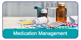 Medication Management: A hand holding a variety of pills.